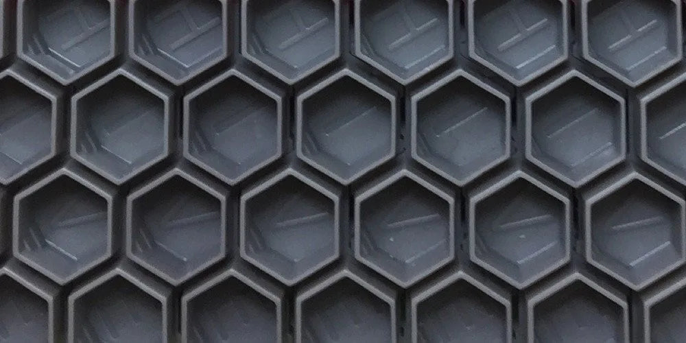 close up of hive caps hexagon shaped cups