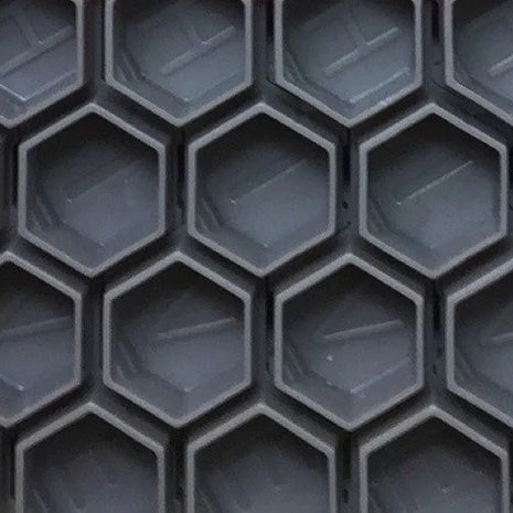 close up of hive caps hexagon shaped cups