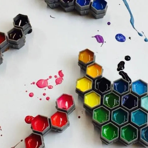 hive shaped ink cups used for tattooing