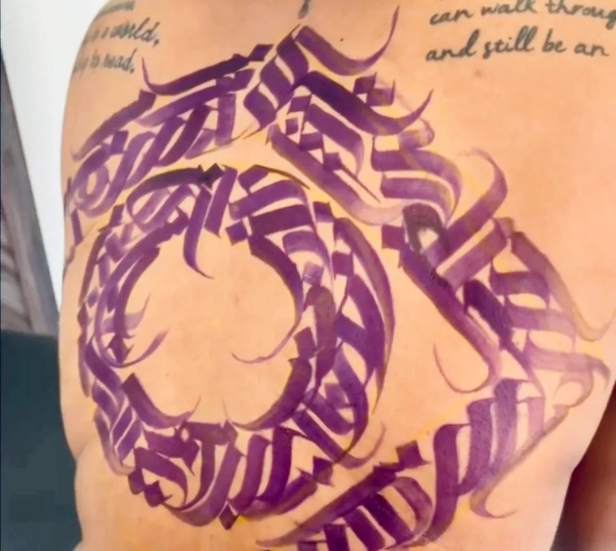 CALLIGRAPHY back tattoo using electrum refillable stencil markers