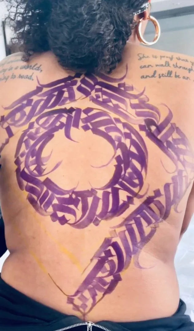CALLIGRAPHY back tattoo using refillable stencil markers