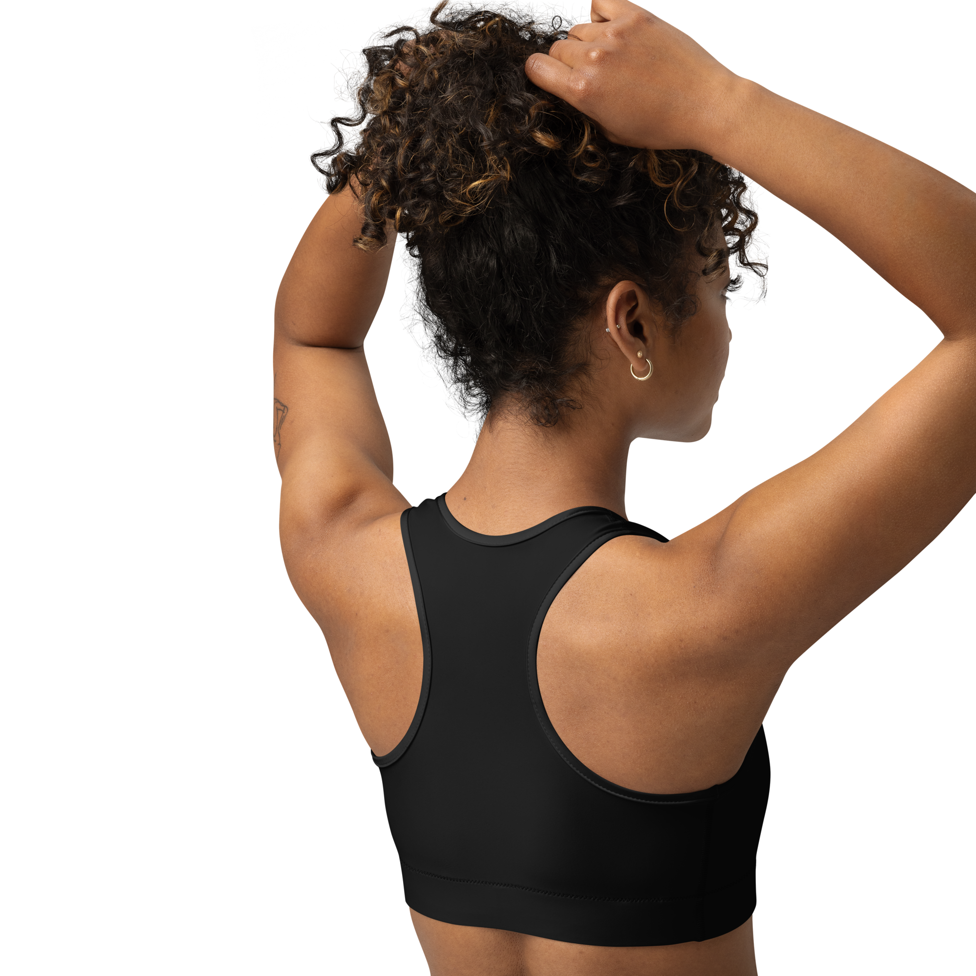 Person wearing a black sports bra from electrum supply