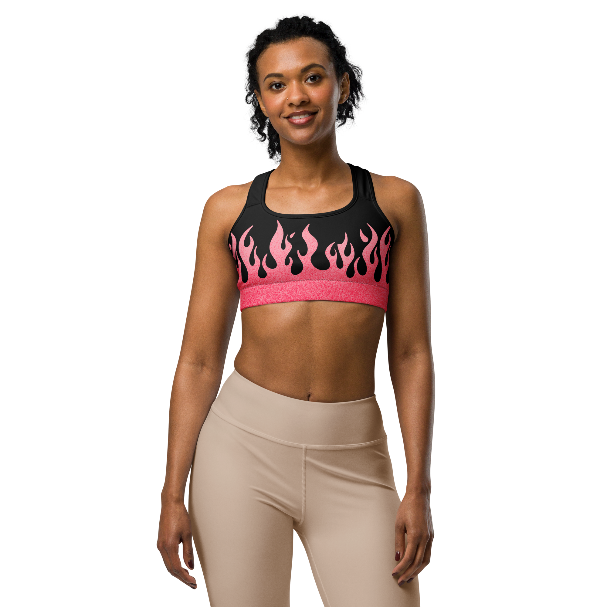 Woman wearing a black sports bra with pink flames