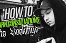 tattoo artist looking at work "how to turn consultations into tattoo bookings"