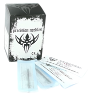 A box of 20g 2-inch body piercing needles from Precision Needles, with individual needles packaged in sterilized pouches, displayed in front of the box.