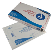 A box of Dynarex self-sealing sterilization pouches with a blue-tinted transparent cover, indicating the size and product information.