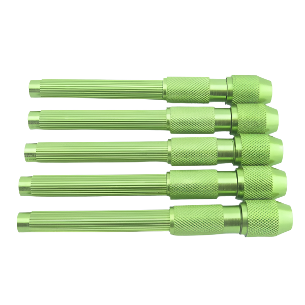 Five green metal tools arranged on a white background