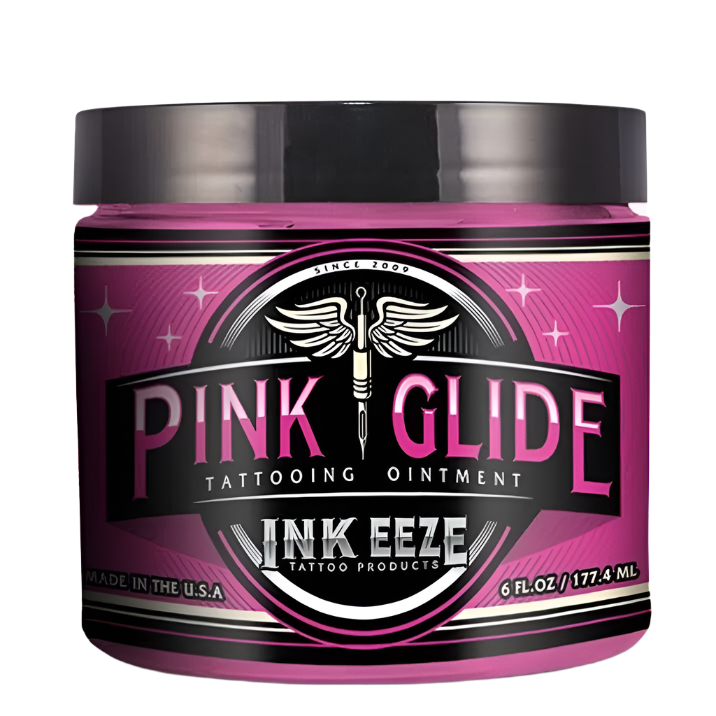 A container of INKEEZE Pink Glide Tattoo Ointment with a pink label, predominantly designed as a lubricant for tattoos.