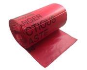 A roll of red biohazard waste disposable bags with the words 'Hazardous Waste' printed in black.