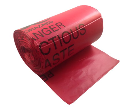 A roll of red biohazard waste disposable bags with the words 'Hazardous Waste' printed in black.