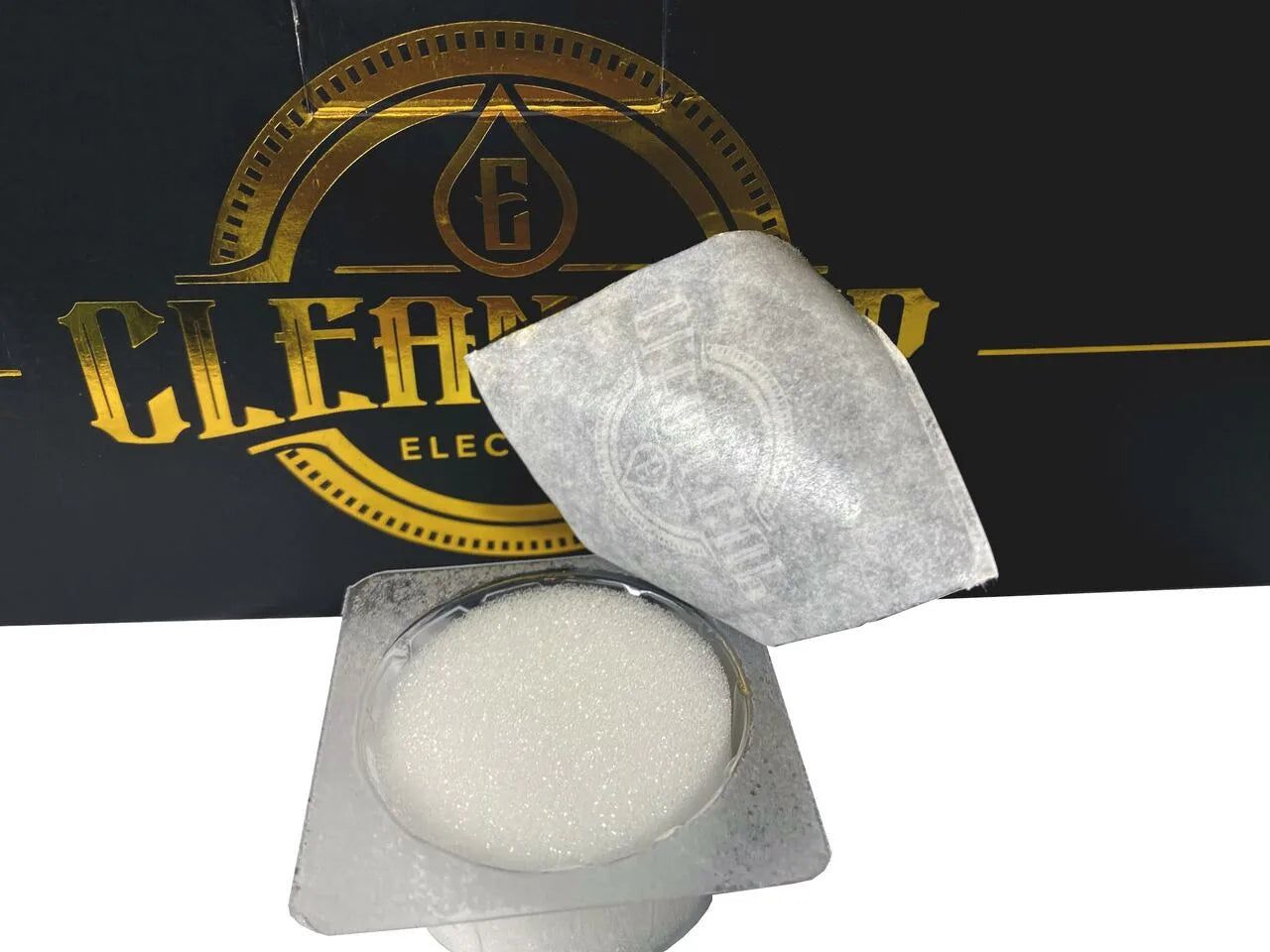 Clean cup with packaging open to show contents