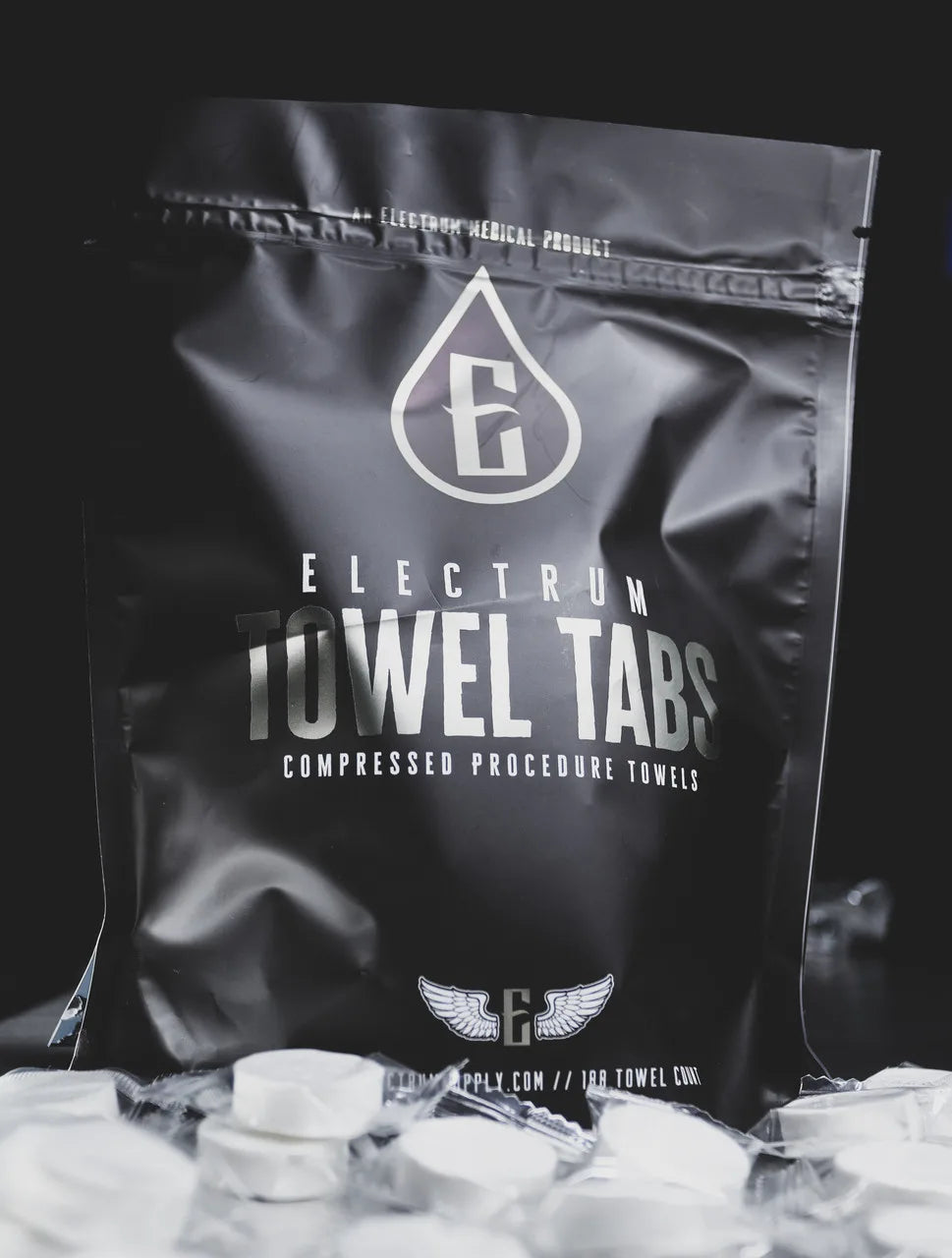 a bag of towel tabs for tattooing compressed