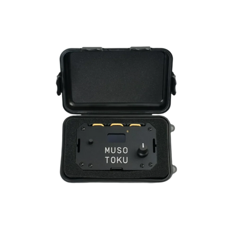 A black hard case cover with the Musotoku brand logo, designed for protecting and transporting tattoo power supply.