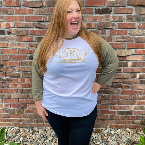 a woman wearing the electrum 3/4 sleeve baseball style shirt 