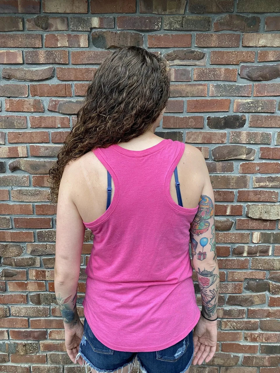 the back of the pink electrum tank top
