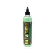 A bottle of Electrum Gold Standard Liquid Solidifier with a green label on an white background.