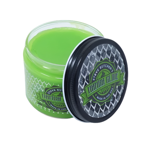 A green tub of Mamba Glide tattoo aftercare cream 