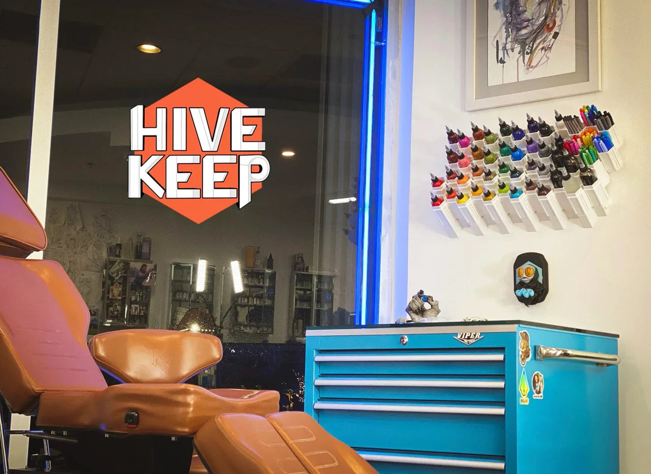 tattoo station featuring the hive keep tattoo ink storage solution
