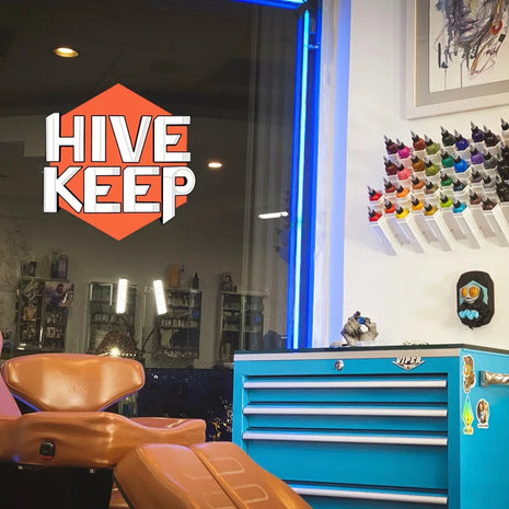 tattoo station featuring the hive keep tattoo ink storage solution
