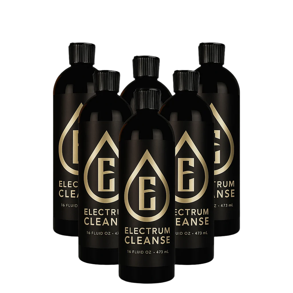 Set of black bottles with gold logo and text on a white background