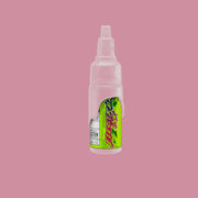 A bottle of Electrum Tattoo Ink in a light pink color 