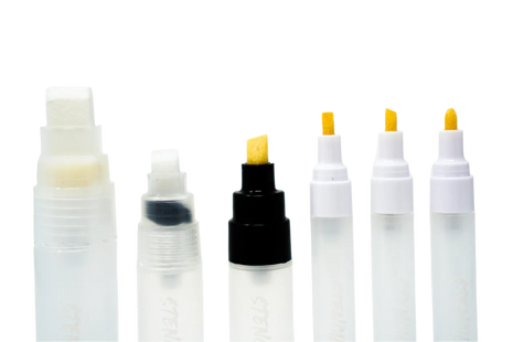 A collection of Electrum refillable stencil lettering markers with various replacement tips, including flat, chisel, and bullet, displayed on a white background.