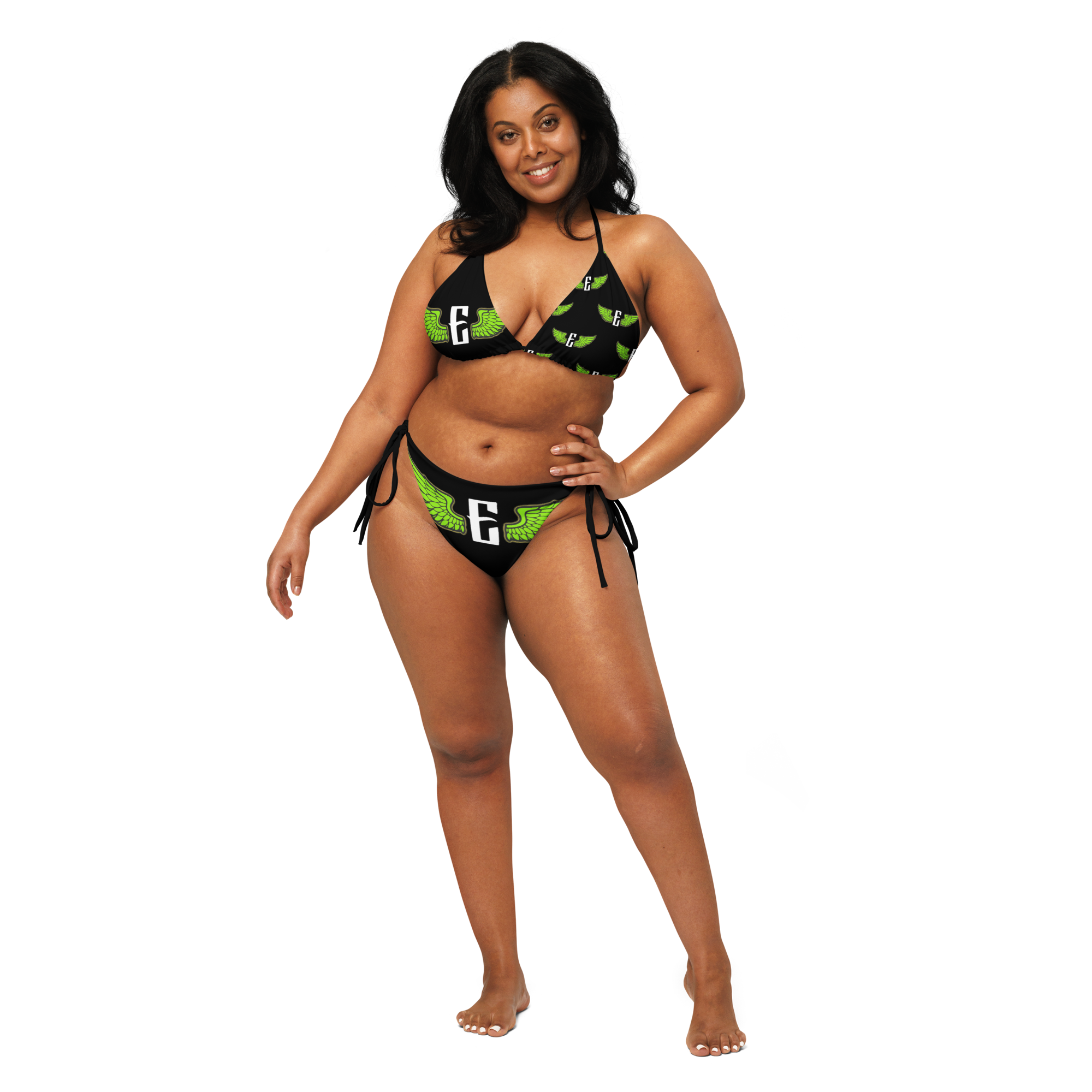 Woman wearing a black and green bikini with the flying e electrum brand logo 