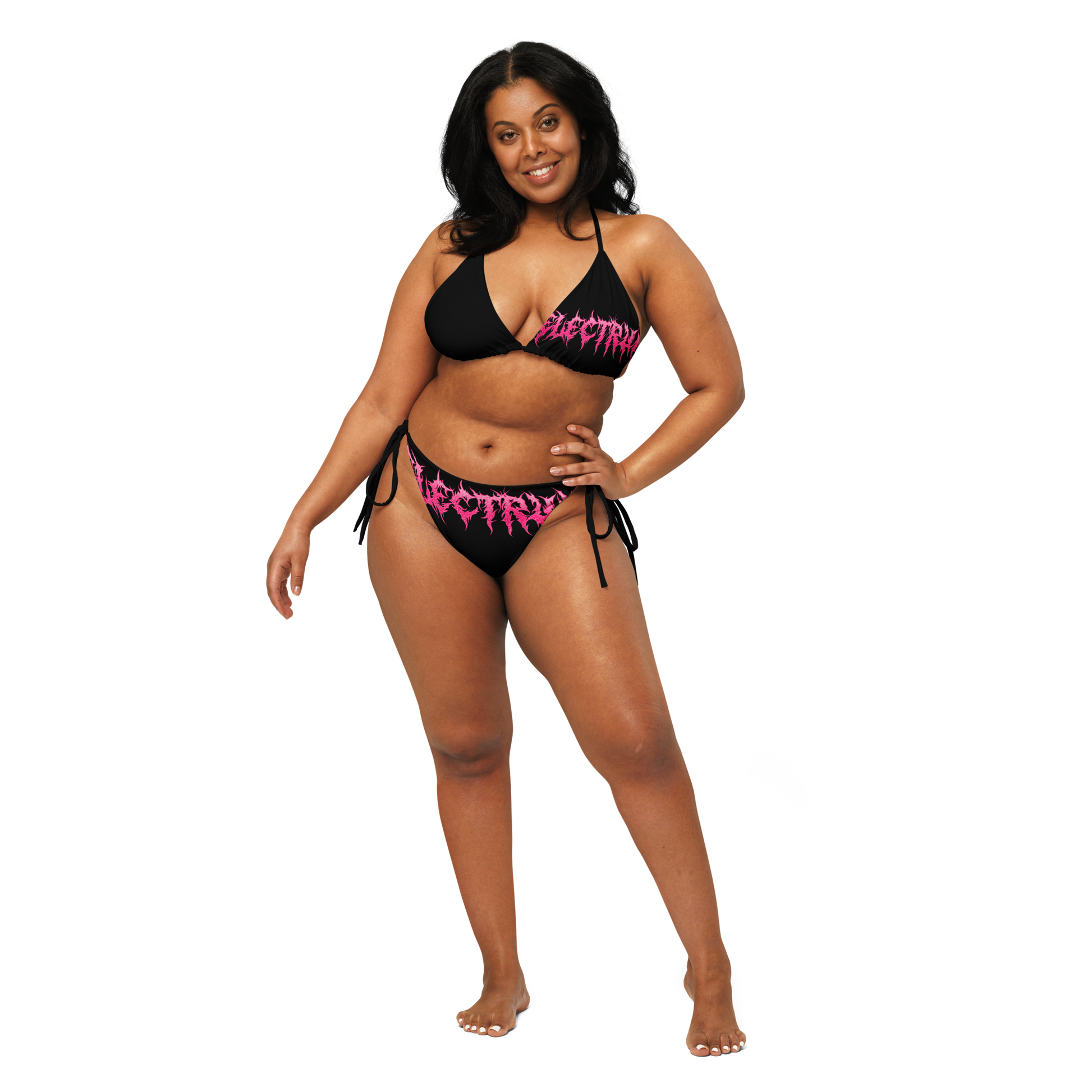 Woman wearing a black and pink bikini with 'Electrum' branding 