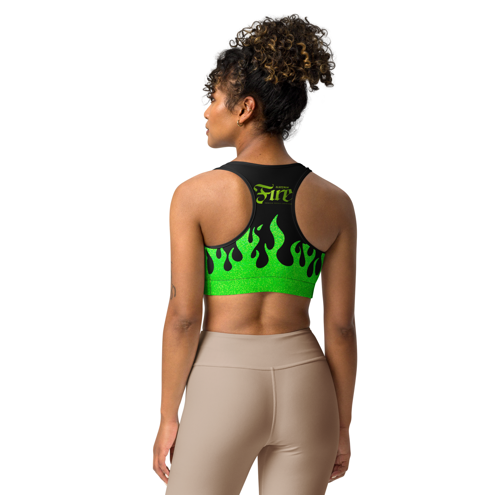 person wearing a black and green sports bra with a fire logo and fire print
back