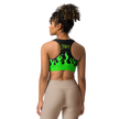 person wearing a black and green sports bra with a fire logo and fire print
back