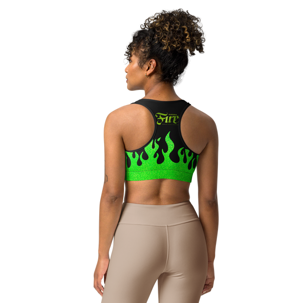 person wearing a black and green sports bra with a fire logo and fire print
back
