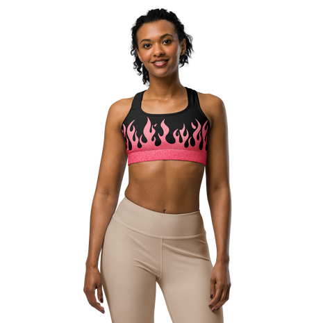 Woman wearing a black sports bra with pink flames 