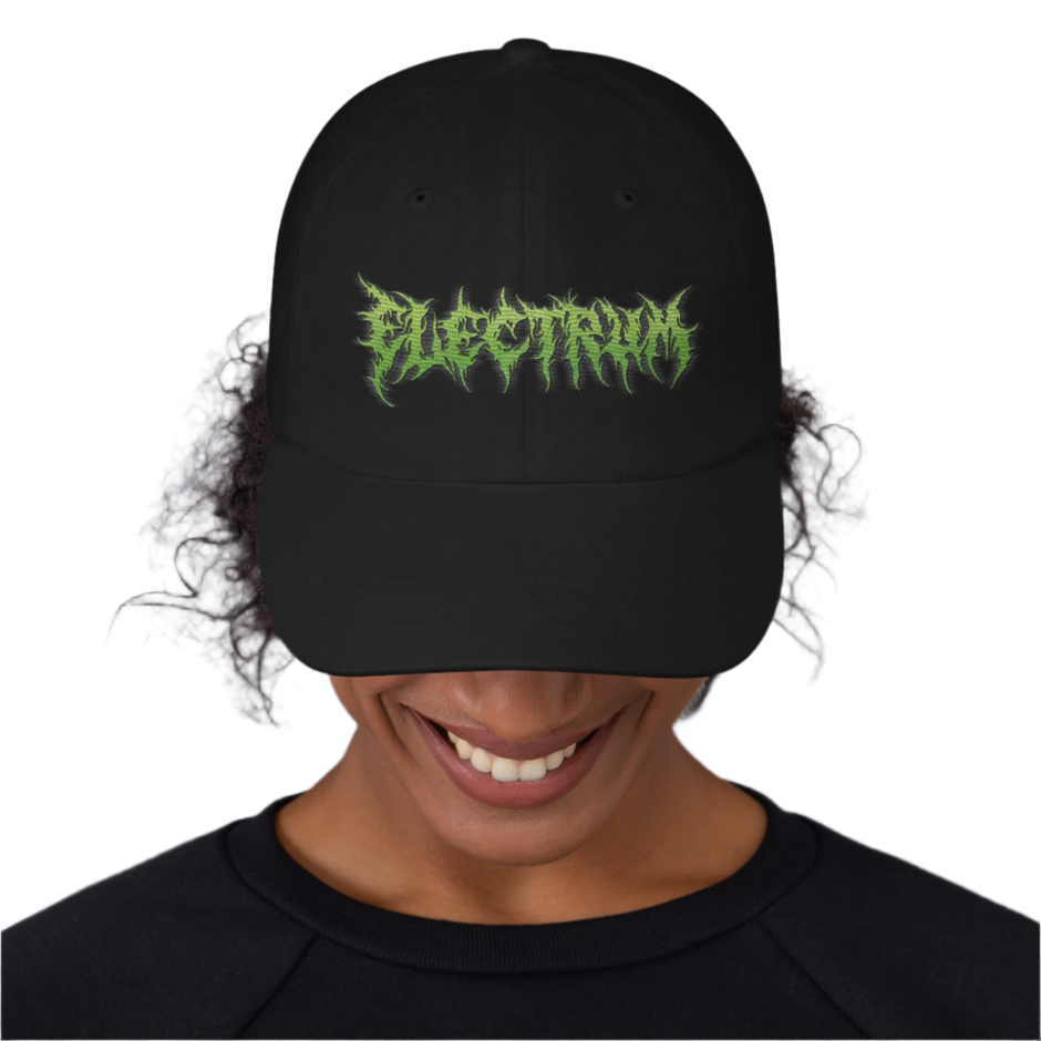 black dad hat cap with green embroidery saying electrum in a metal font