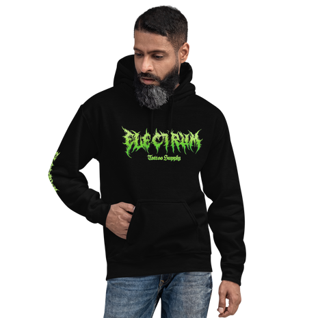man wearing a black electrum supply hoodie with green metal style lettering on the front, right arm and back