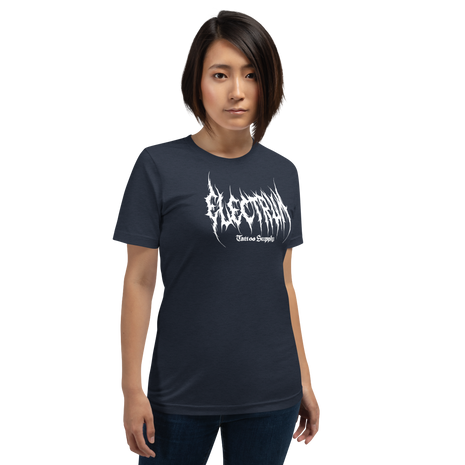 Person wearing a blue t-shirt with white text saying electrum tattoo supply in a metal inspired font