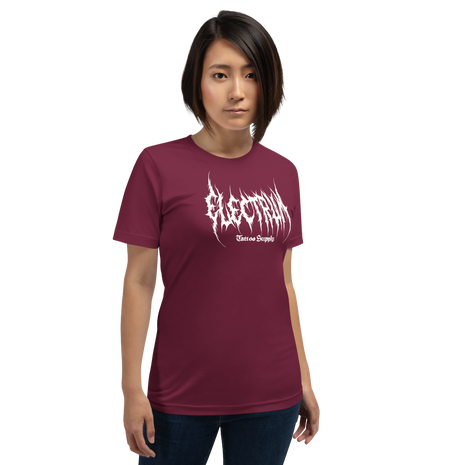 Person wearing a red t-shirt with white text saying electrum tattoo supply in a metal inspired font