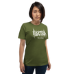 Person wearing a green t-shirt with white text saying electrum tattoo supply in a metal inspired font